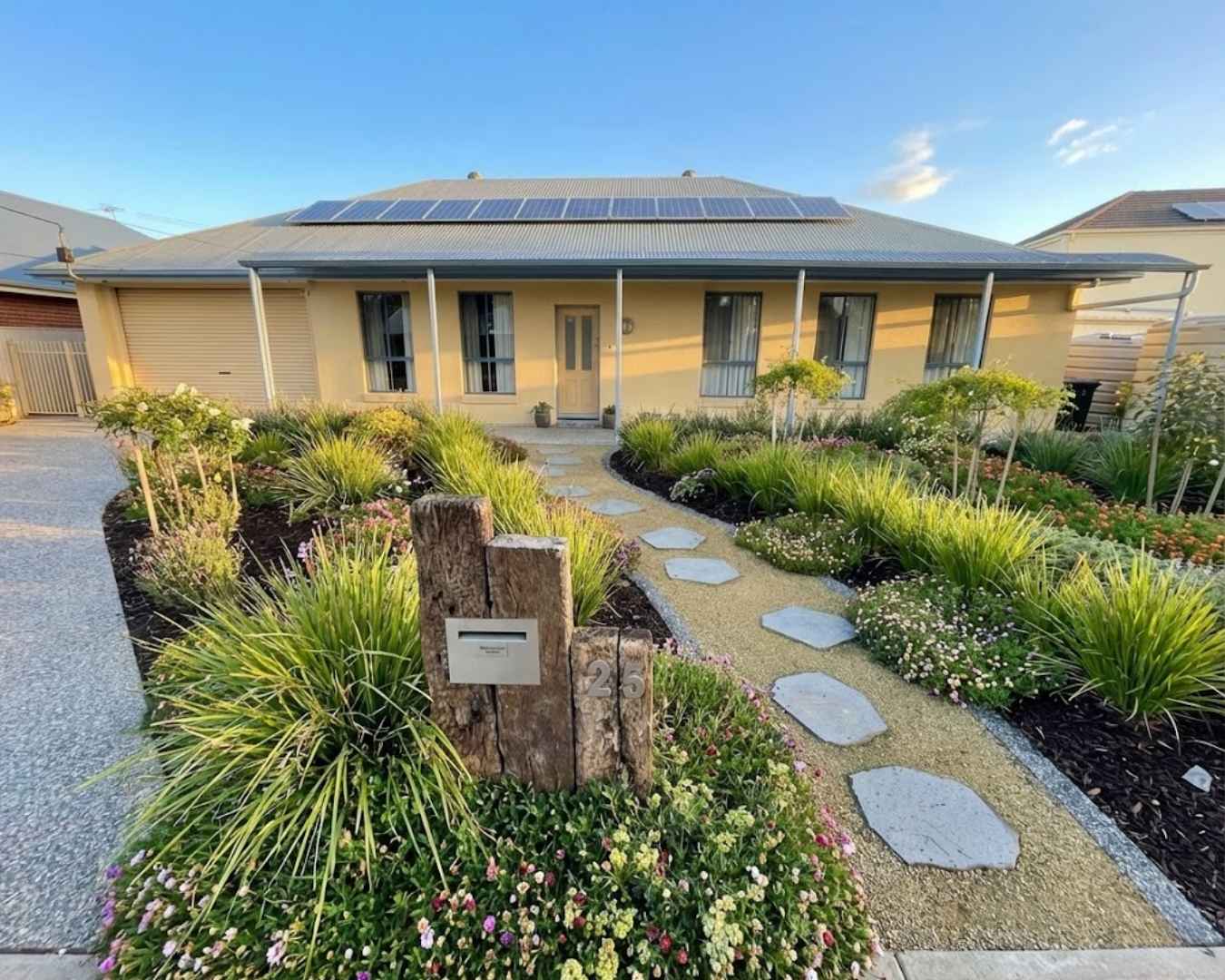 Completed outdoor landscaping with spotted gum deck and pergola in Adelaide
